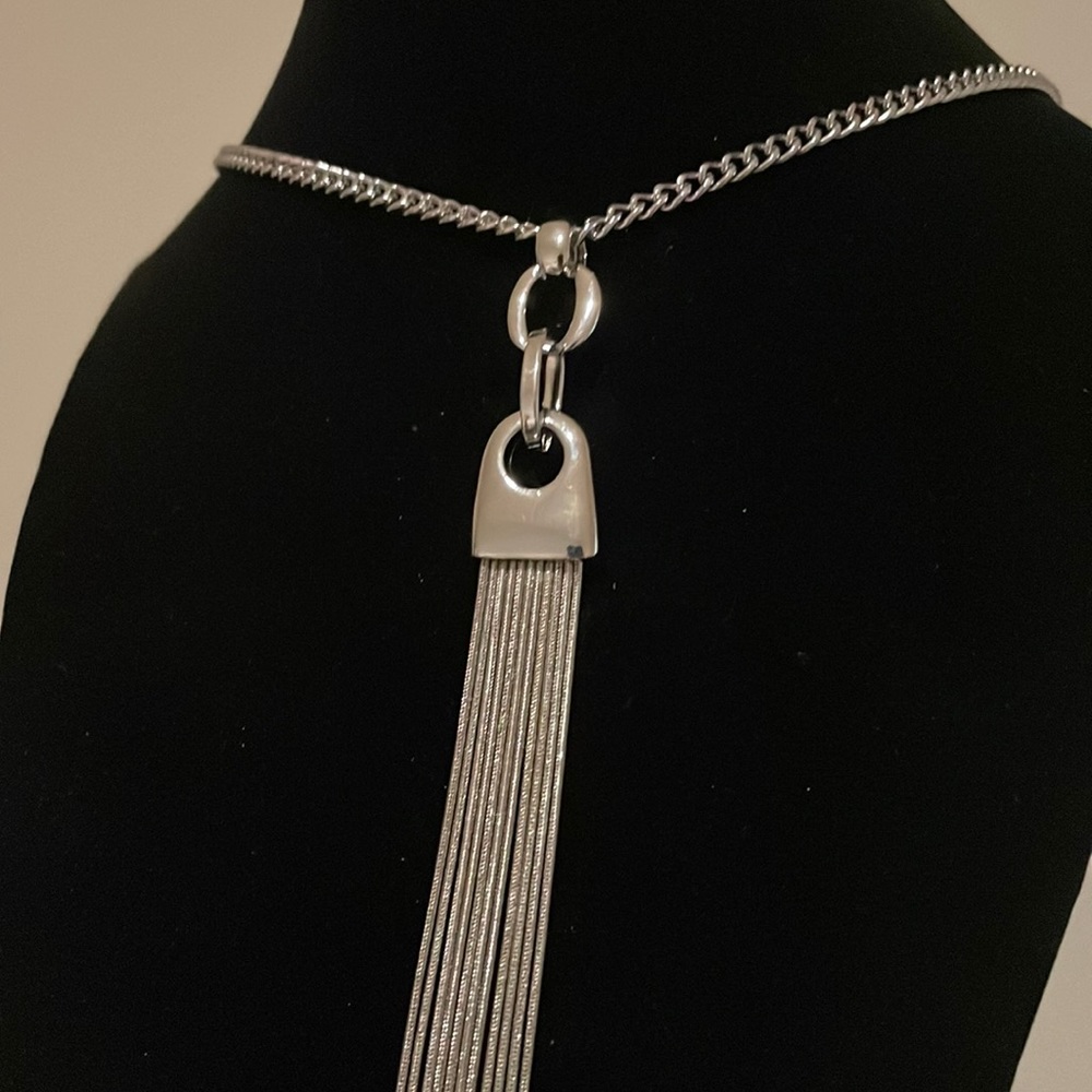 21 in long silver color great quality necklace. Very sexy, very special.